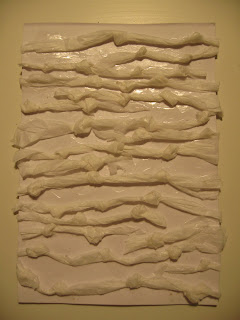Strips of tissue paper,knotted 