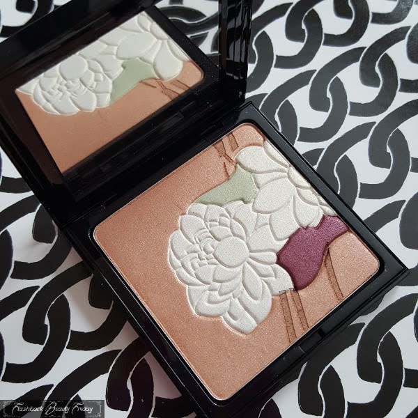 open square palette with lid and beige powder with white, green and plum flower design engraved