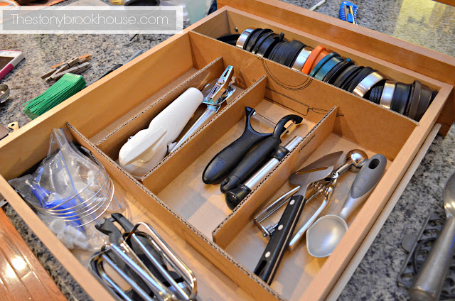 Organizing drawers with cardboard boxes