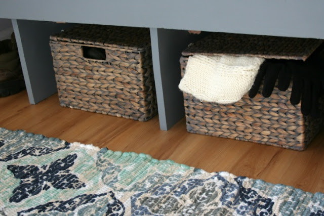 See how I transformed a dark basement entry way into a beautiful bright mudroom in just a few weeks.