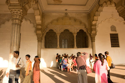 Tourists posing in the Emperors public Hall