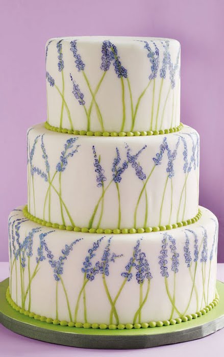 Gold purple and green hand painted wedding cake a row of pearls lines 