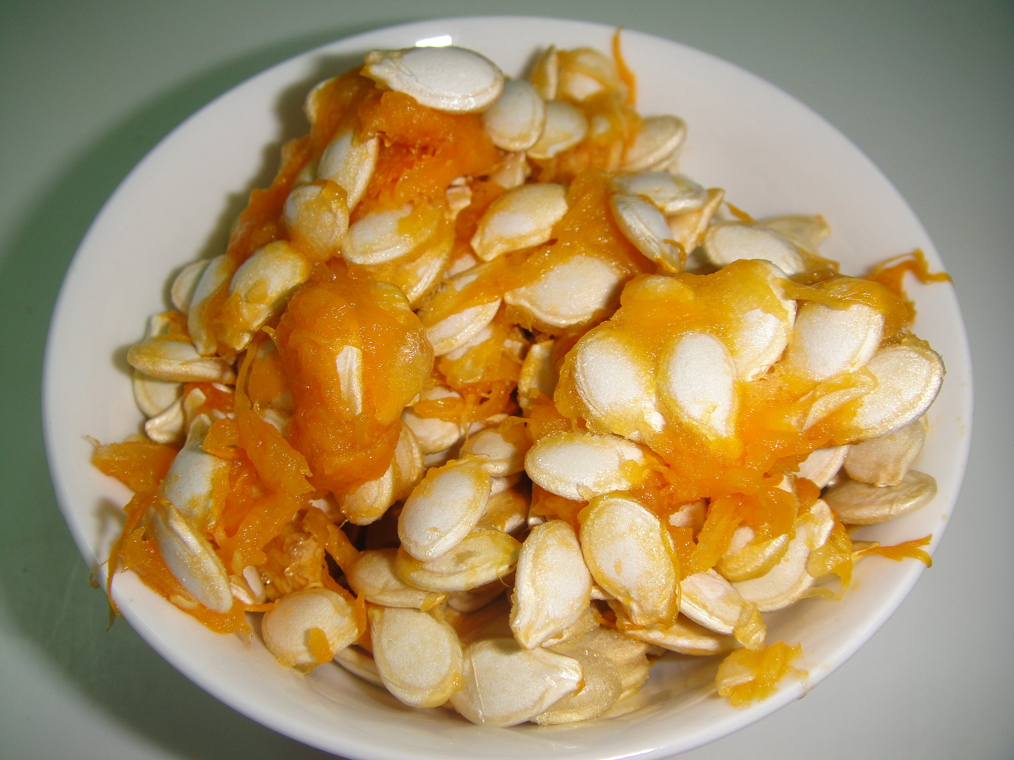 cup pumpkin seeds 1 Tbsp salt 2 cups water 1 Tbsp olive oil title=