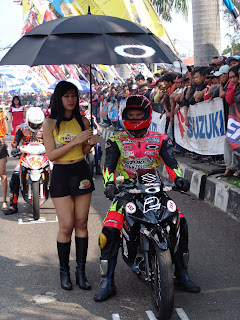 hot umbrella girl with her racer