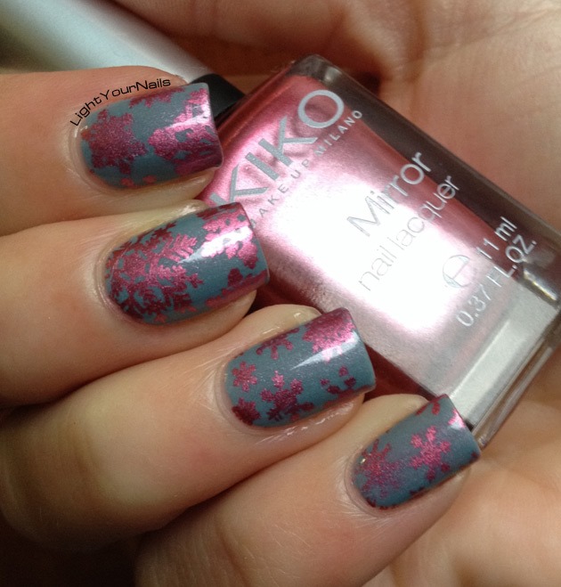 Pink snowflakes nailart stamped with QA86 plate