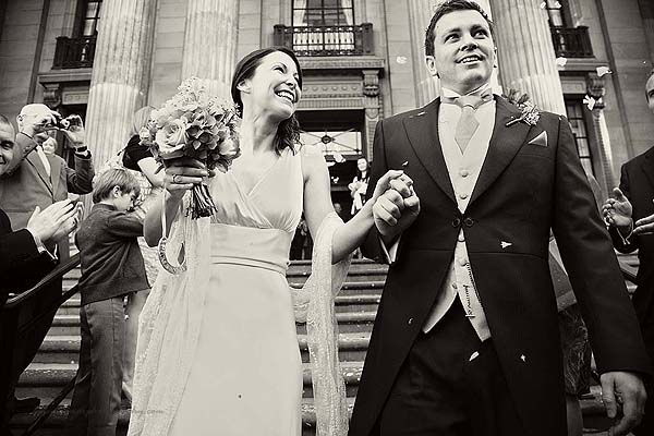 guests throwing confetti at Marylebone Town hall wedding