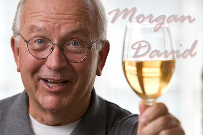 Morgan David toasting with a glass of wine