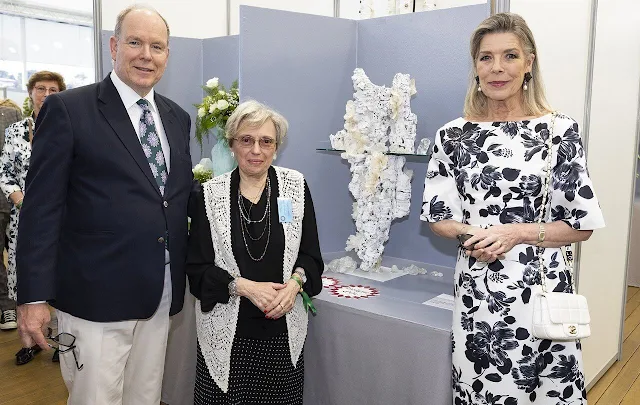 Princess Caroline wore a Kora floral-print faille maxi dress by Emilia Wicksead. Pearl earrings and Chanel white leather bag