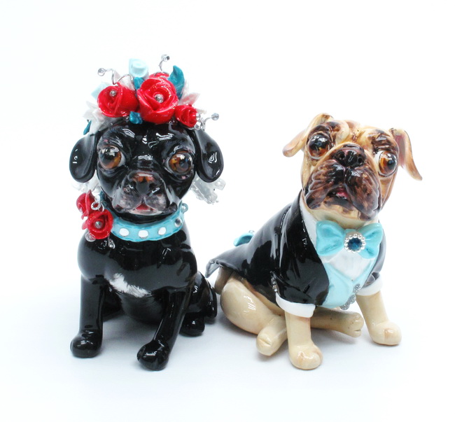 Black Puggle is Bean wearing red rose Tiffany blue and white veil 