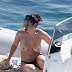 Charli XCX exposes beautiful topless big tits on a boat  (3 photos)