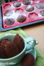 A cup and a tray of double chocolate madeleines from Anyonita Nibbles