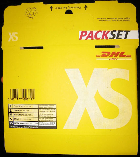 bei DHL ein Leerpaket XS für 1 Euro 49 Cent [Bitte den Adressaufkleber Brief International nicht vergessen am besten auch gleich einen Ersatz].