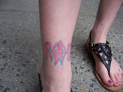  at the bottom of the leg, she had the word "Rad" tattooed. Nebraska 