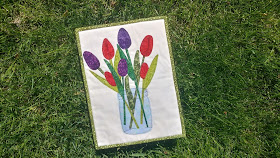 Tulips in a jar mini quilt using Island Batik fabric and Aurifil thread