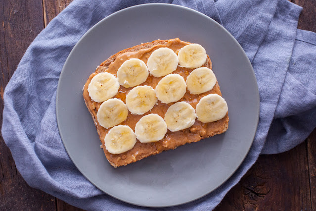 Peanut Butter and Banana Toast: Classic and Nourishing Combination of Natural Peanut Butter, Sliced Banana, and a Touch of Sweetness