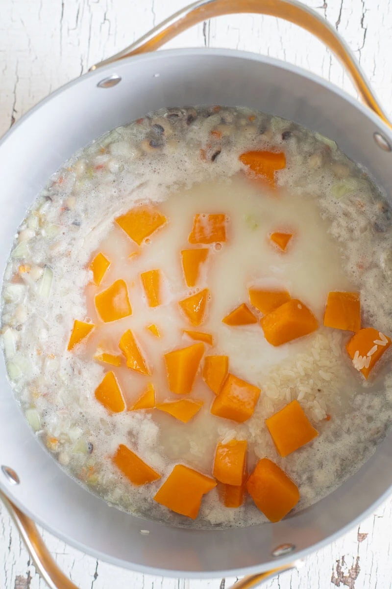 Added rice and pumpkin and coconut milk to dish to make black eye peas and rice.