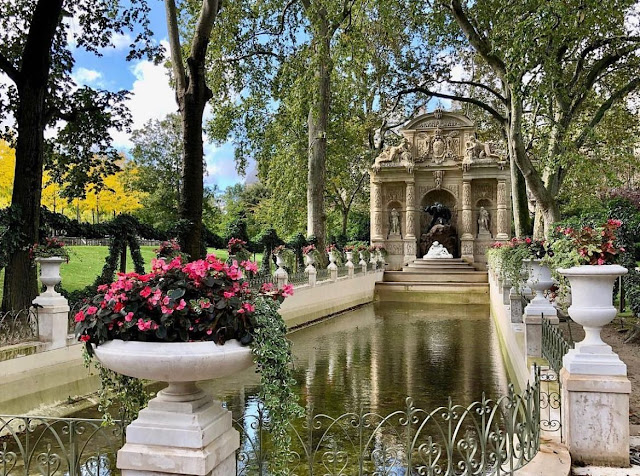 The tree lined water feature of the Medici Fountain in Luxembourg Gardens