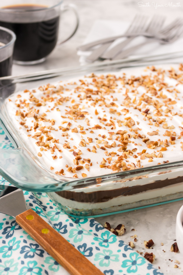 Chocolate Delight! The original layered dessert recipe with chocolate pudding, cream cheese and cool whip on top of a pecan shortbread crust. Also called Better Than Sex Cake, Robert Redford Pie and Chocolate Lush!