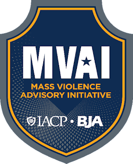 The Mass Violence Advisory Initiative (MVAI) blue and gold shield logo. IACP and BJA