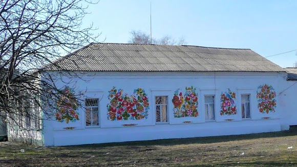 Петріківка. Будівлі, прикрашені періківським розписом