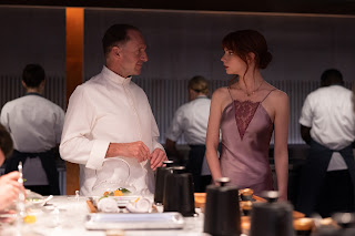 Ralph Fiennes and Anya Taylor-Joy in the film THE MENU. Photo courtesy of Searchlight Pictures.