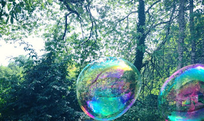 Summer days in the garden at De Tout Coeur Limousin - blowing bubbles  