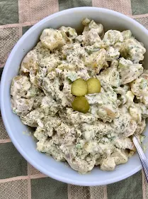 Finished bowl of dill pickle potato salad.