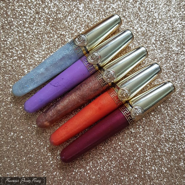 Versace retro lipgloss collection on glitter backdrop