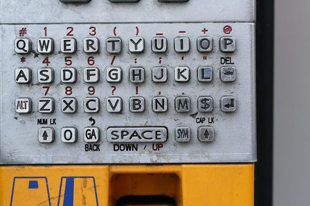 pay phone number/letter pad