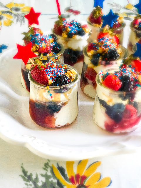 A perfect dessert for summer and cookouts with extreme layers of yumminess. The parfait starts with a spoonful of leftover cheesecake, fresh berries, yogurt, and berry jelly. Don't forget to top it off with a generous spoonful of granola. Did I mention these are extreme?