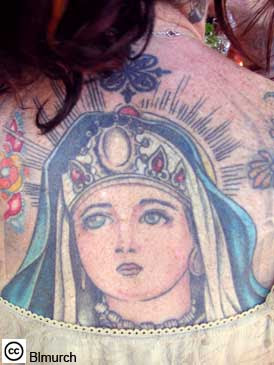 Religious Tattoo Design on Female Back