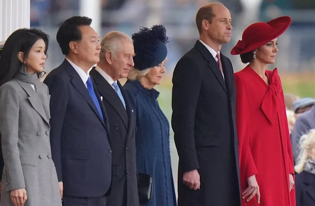 Princess of Wales wore a scarlet cape dress by Catherine Walker and a hat designed by Jane Taylor. First Lady Kim Keon Hee