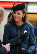 Kate Middleton and the Queen on Underground Visit to Baker Street Tube .