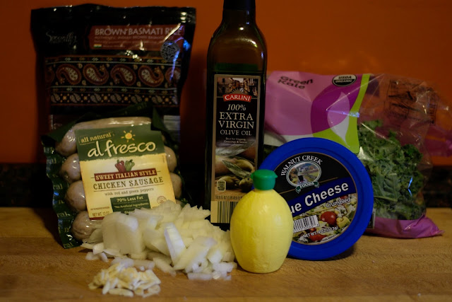 The ingredients needed to make the chicken sausage and kale over rice recipe.