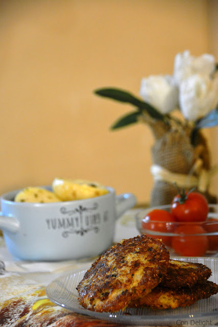 quinoa-cauliflower-latkes-with-tomatoes-on-table