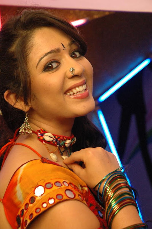 Charmi Hot in Saree Stills navel show