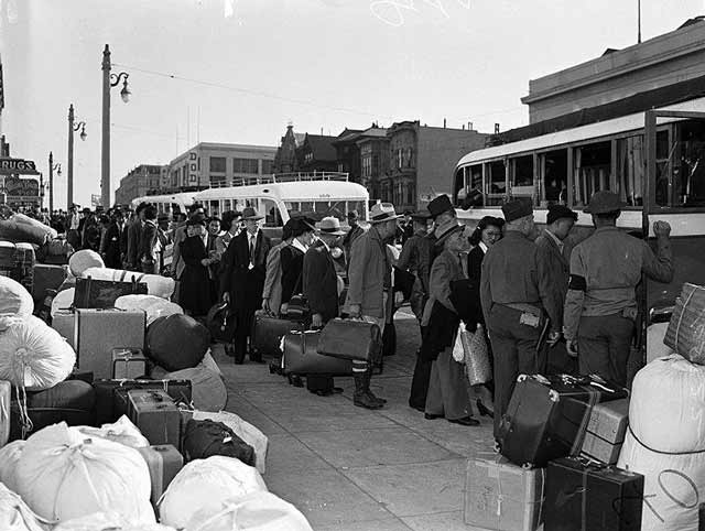 Japanese going into internment in San Francisco, 6 April 1942 worldwartwo.filminspector.com