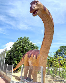 The last dinosaur will be towering over you as you approach the final stretch of the pathway.