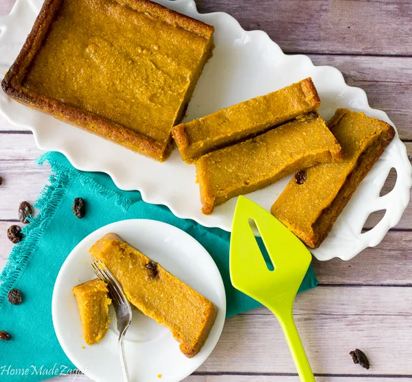 Caribbean Pone - A spicy, mouthwatering pudding like baked dessert made from cassava, sweet potato and pumpkin #HomeMadeZagat