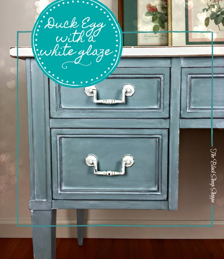 Duck egg blue chalk paint with a winter white glaze.