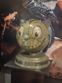 Batman Returns Max Shreck smiling cat logo prop