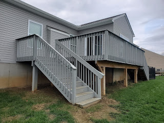 picture of deck with peeling deck paint before deck painting and lockdown encapsulation by ultra thick high stretch kong armor deck restore coating