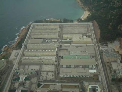 Image of the Stanley Maximum Security Prison in Hong Kong, taken from the air, sourced from the Wikipedia Commons. This image was taken by Author= User:Heli Pauline and she has transferred to the public domain for any purpose.