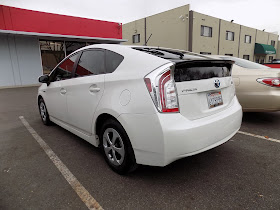 Prius rear bumper and tailgate damage after repairs at Almost Everything Auto Body.