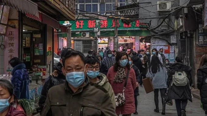 China vuelve a confinar distrito Wuhan por un rebrote covid-19