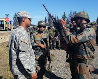 Indian army soilder showing INSAS to US soilder