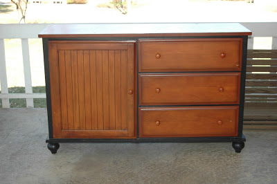 A $20.00 Goodwill dresser gets a major update with a few coats of paint and fun new knobs. www.littlehouseoffour.com