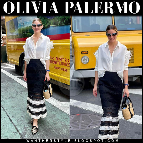 Olivia Palermo in white feather blouse and black and white striped knit skirt