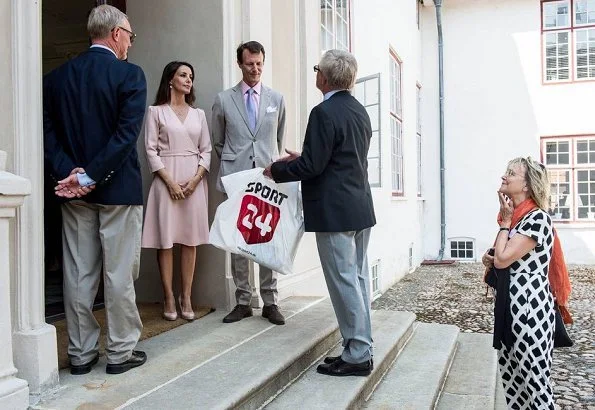 Princess Marie wore GOAT Fashion ballerina wrap dress. Prince Joachim and Princess Marie held a reception for representatives of the charities