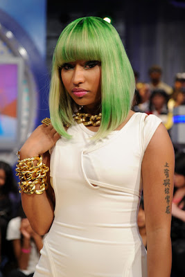 Nicki Minaj is known for her colorful wig and she is not stopping the
